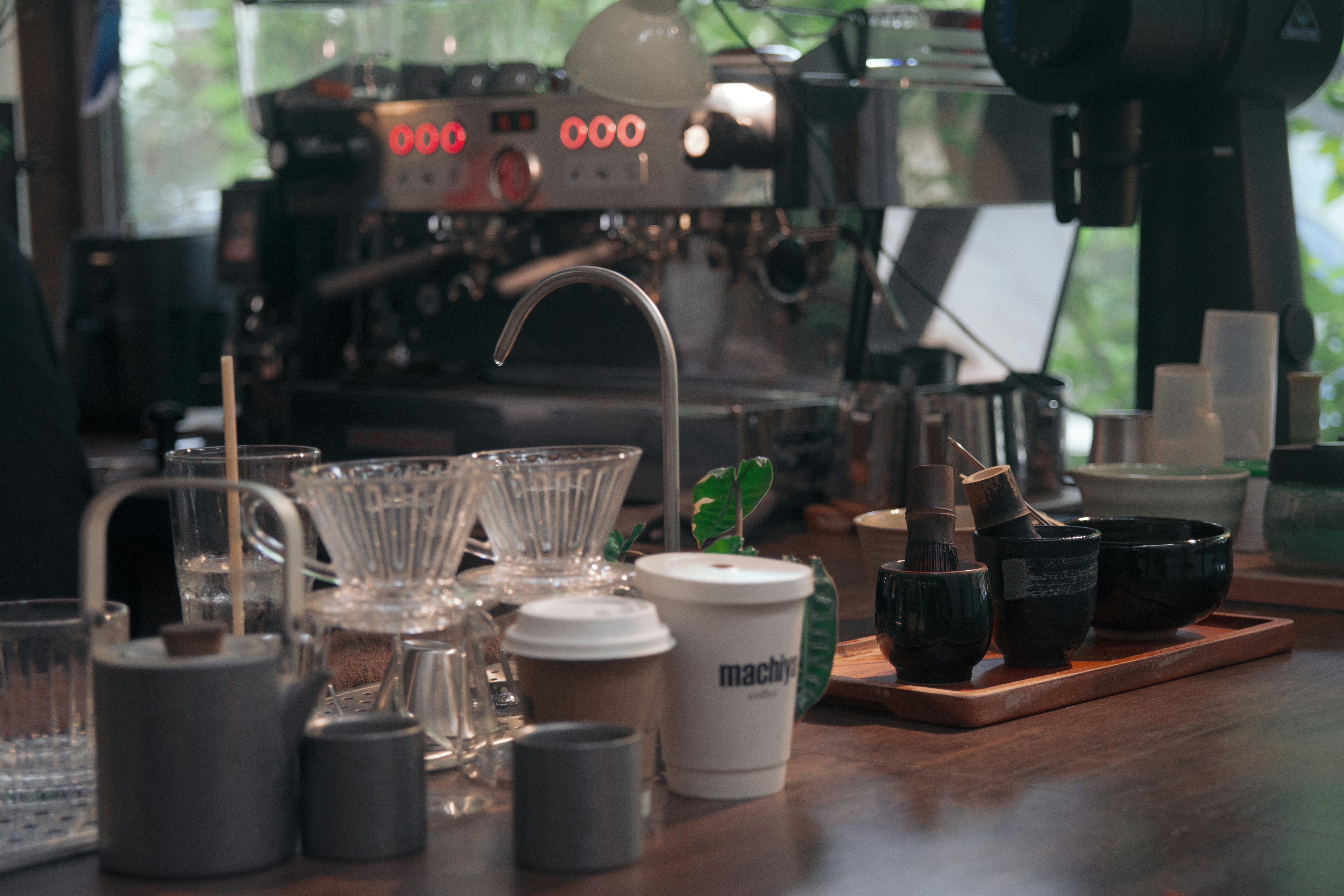 Coffee brewing equipment on a wooden counter