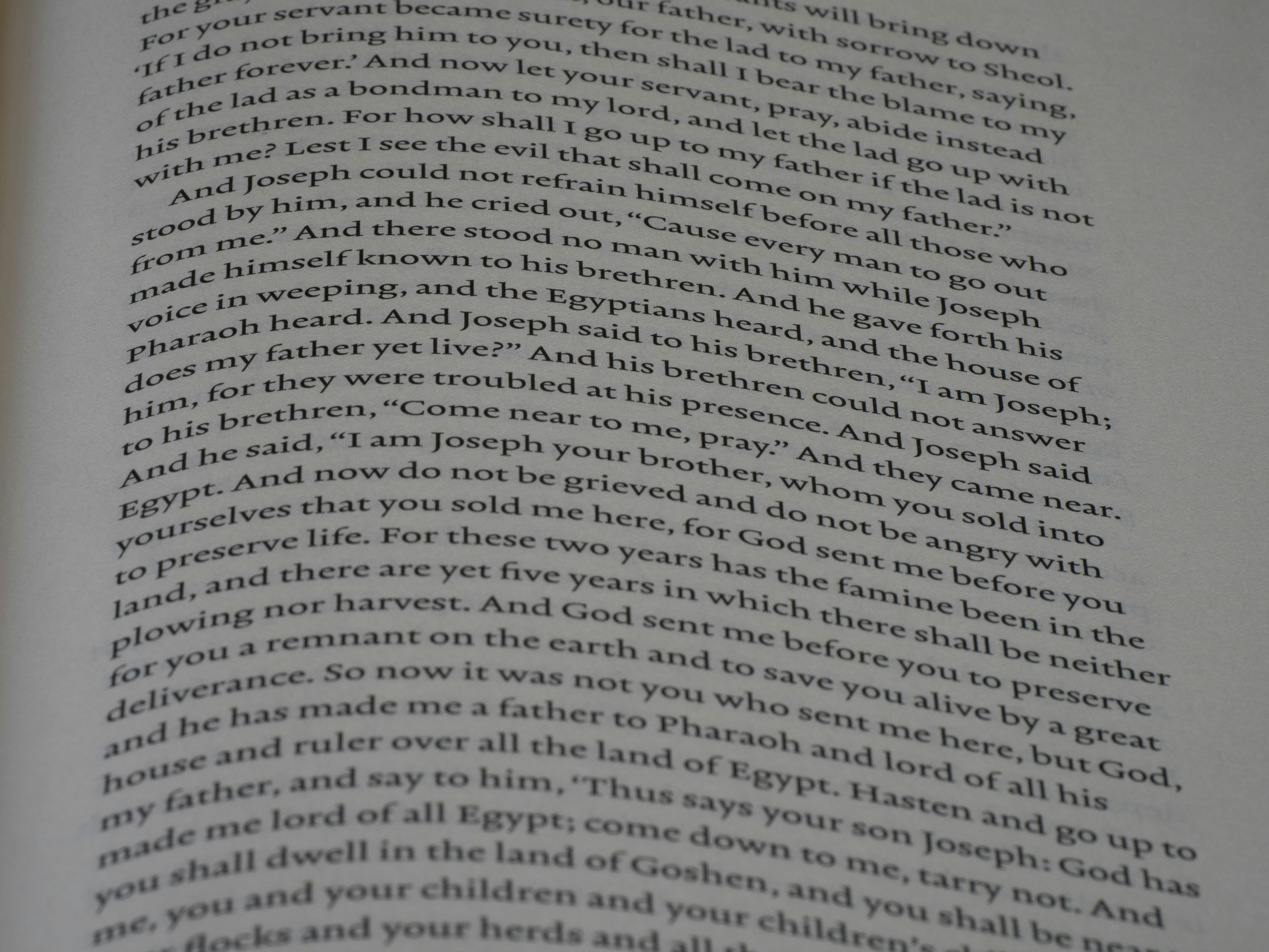 Close-up of text on a page in a book.