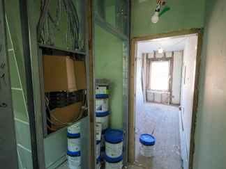 Interior renovation with construction materials and supplies.