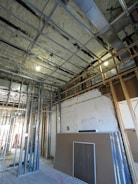 Interior construction with metal studs and insulation.