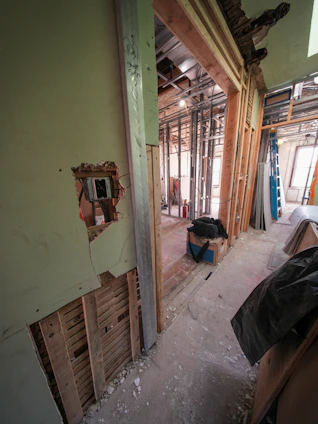 Interior building under construction with exposed framing