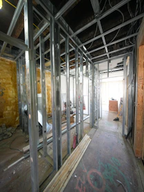 Interior construction with metal studs and exposed ceiling