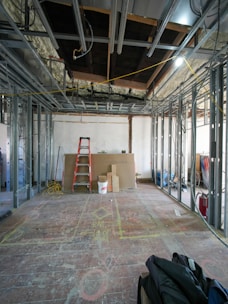 Interior construction with metal studs and ladder