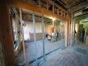Interior construction with exposed beams and framing.