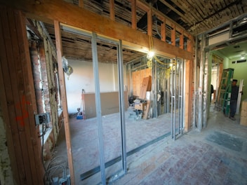 Interior construction with exposed beams and framing.
