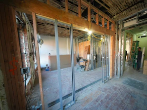 Interior construction with exposed beams and framing.