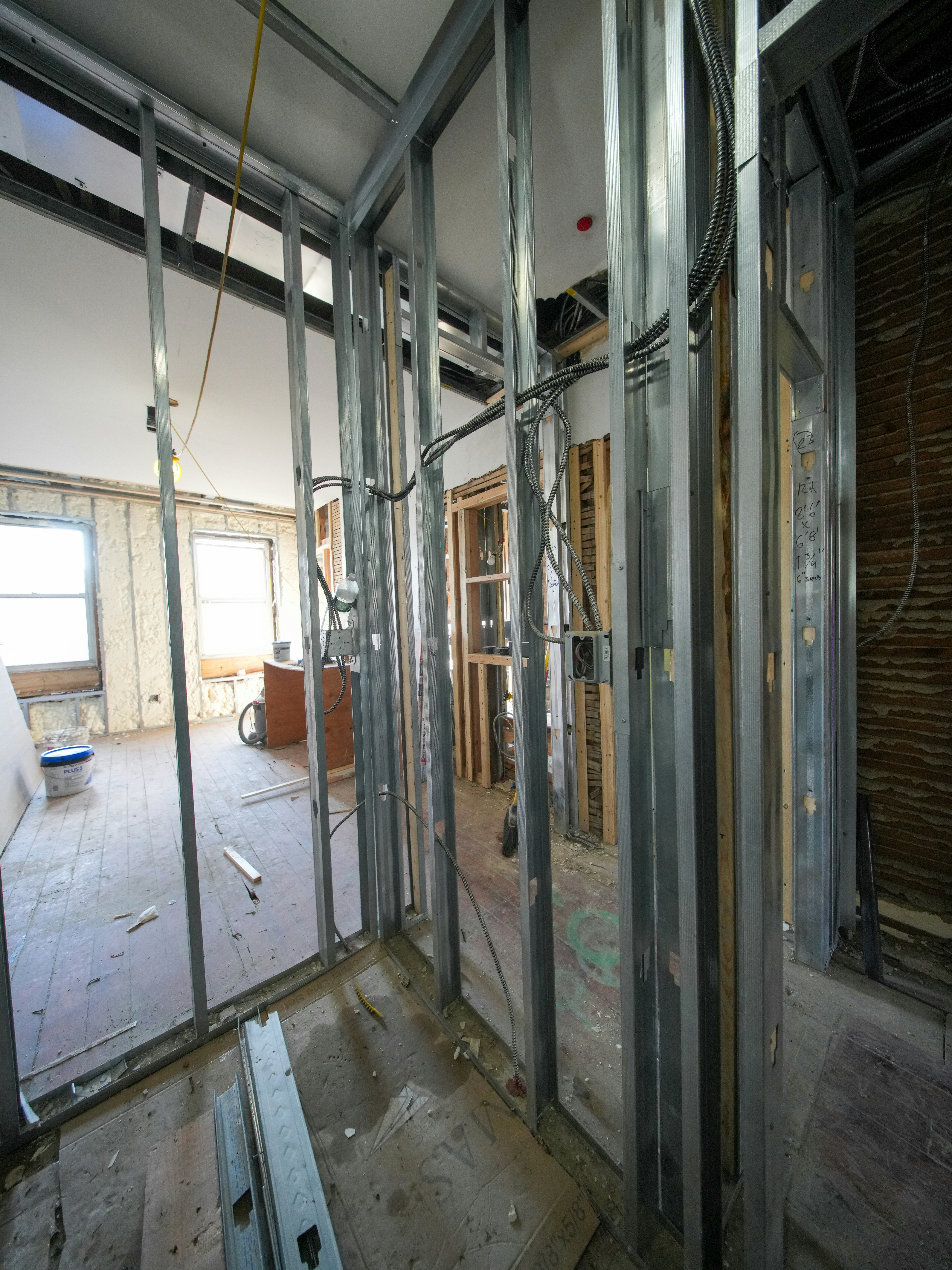 Interior framing and wiring during construction renovation.