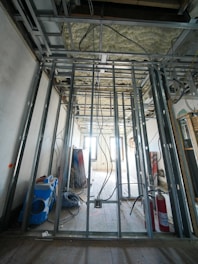 Interior construction with metal studs and exposed wiring