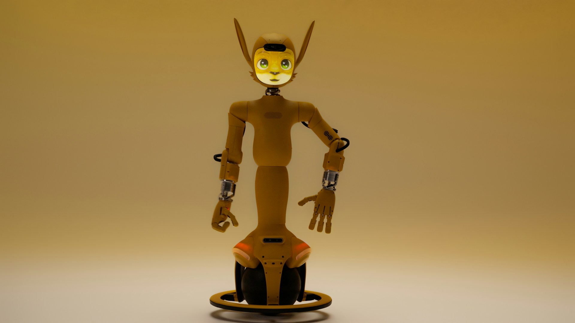 A yellow robot with large ears and glowing eyes.