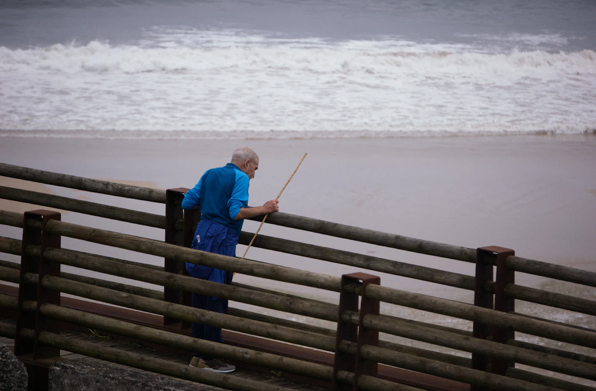 Fisherman on a wooden walkway, Asturias