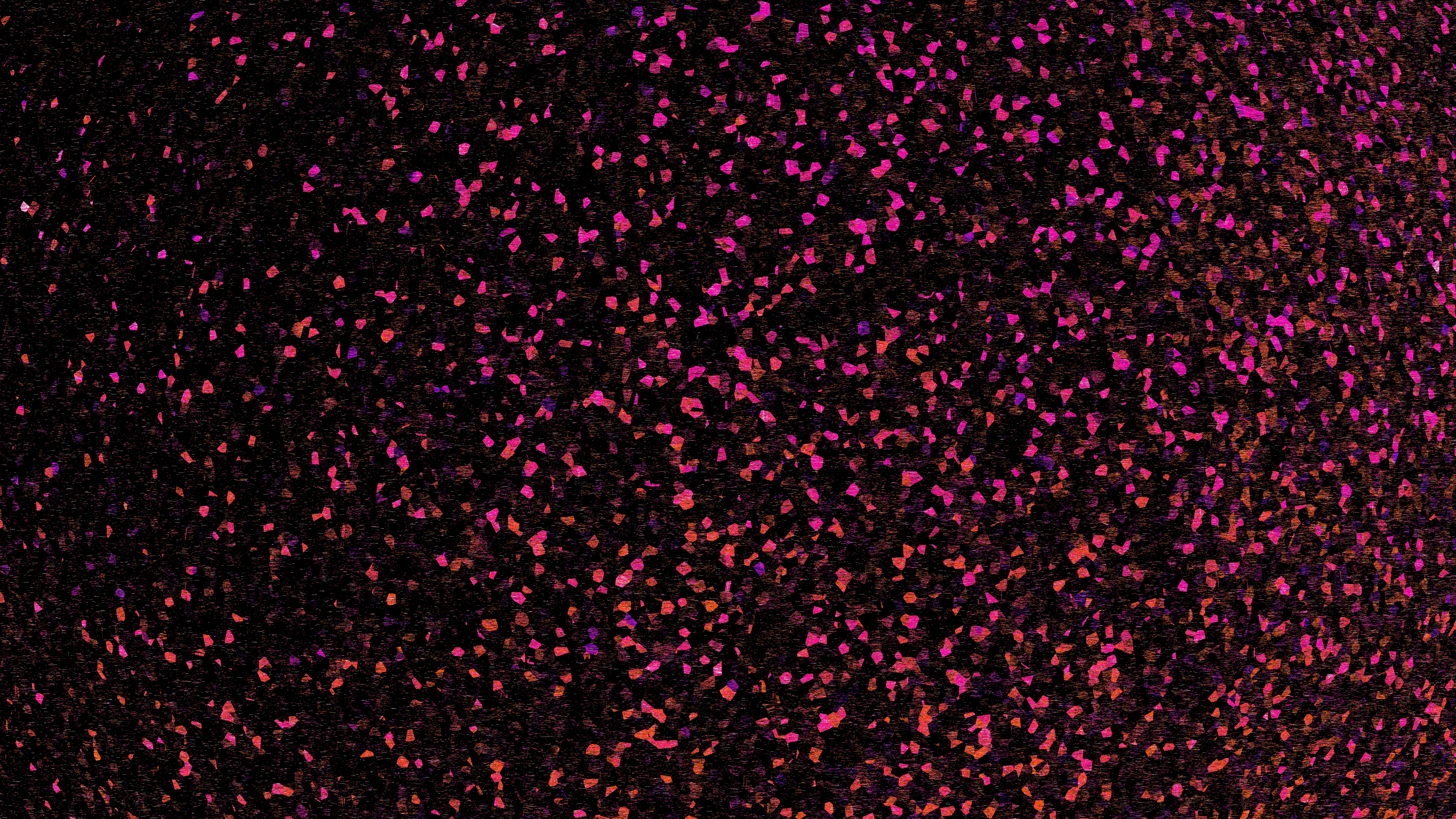 Uno sfondo testurizzato di glitter rosa scuro