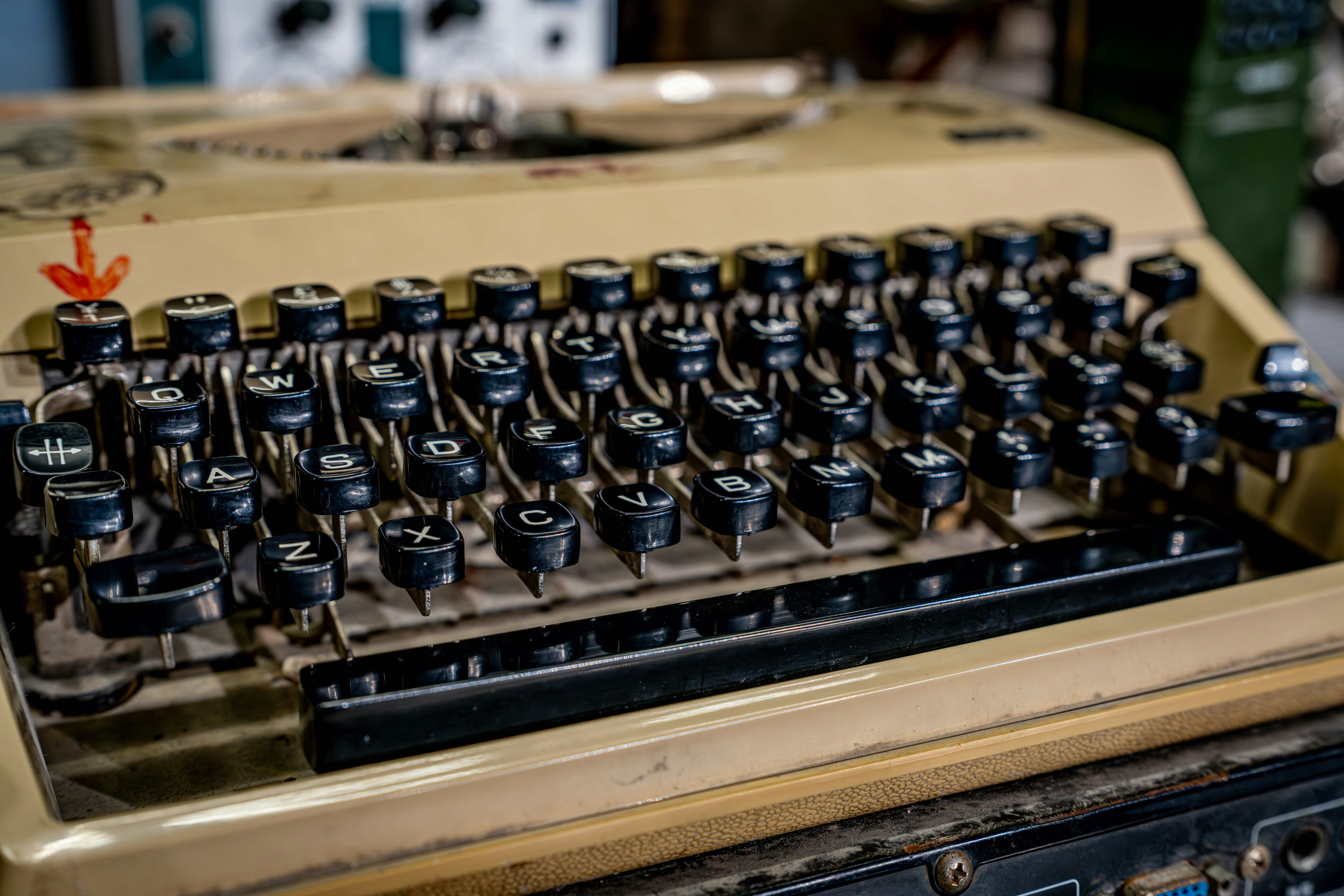 Close-up of an old yellow typewriter keyboard