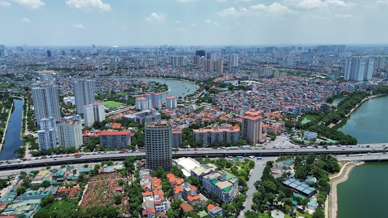 Aerial view of Hanoi cityscape with a winding river