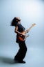 Woman playing electric guitar with head back