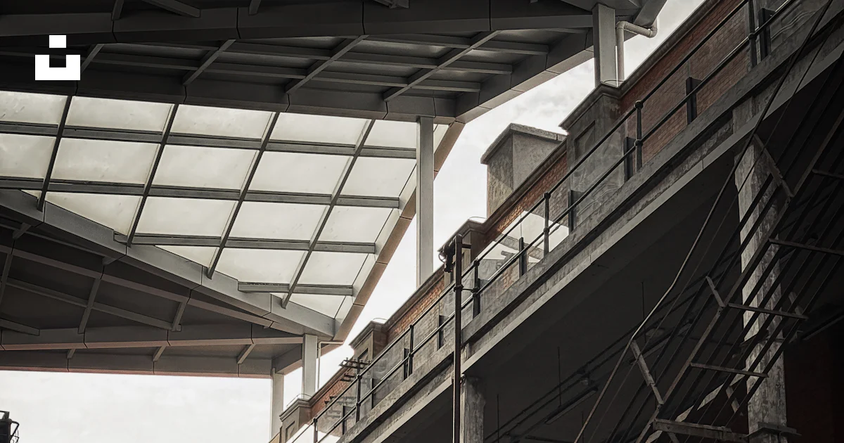 Interior of a multi-story industrial building with balconies. photo ...