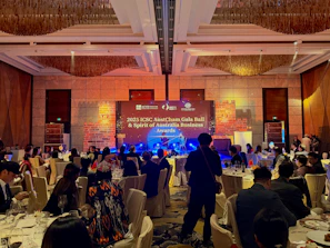 Gala event with a stage and seated guests