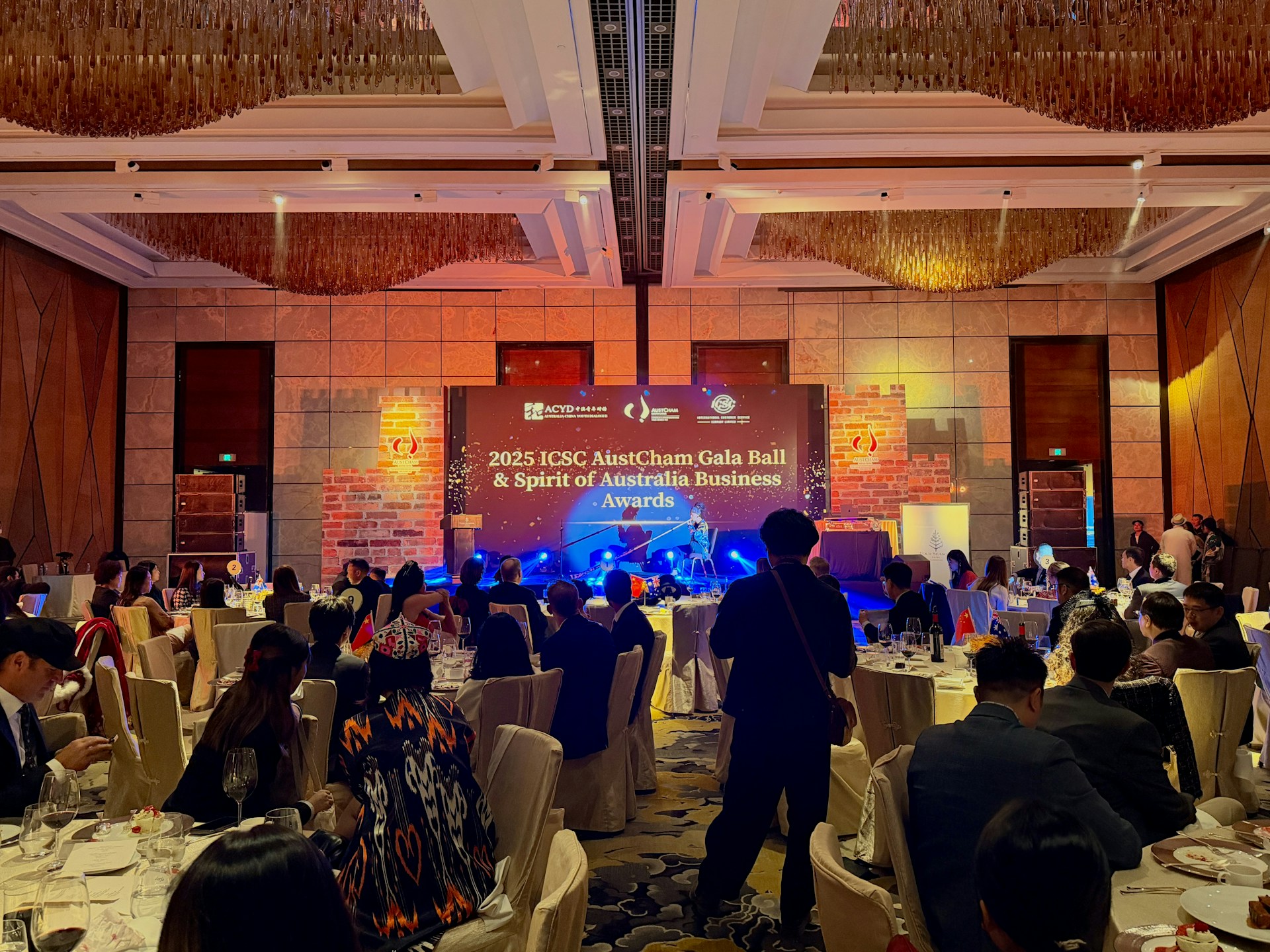 Gala event with a stage and seated guests