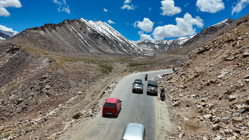 Vehicles on a winding mountain road