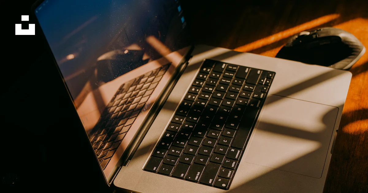 Computer Sunlight Laptop with sunlight streaming through window blinds. photo – Free ...
