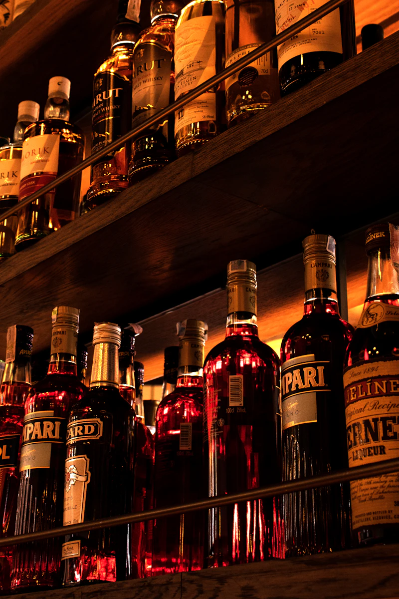 Bottles on shelves at frank