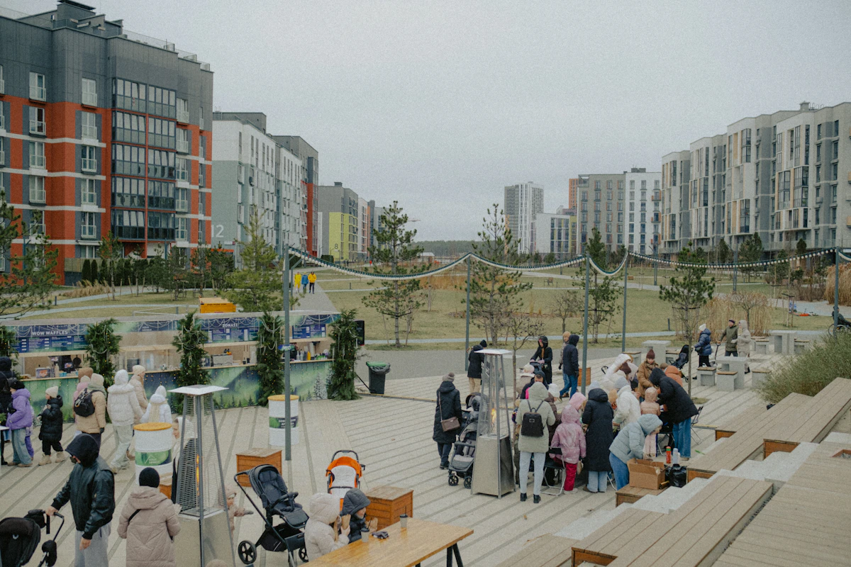People gathered in a public plaza for a community event