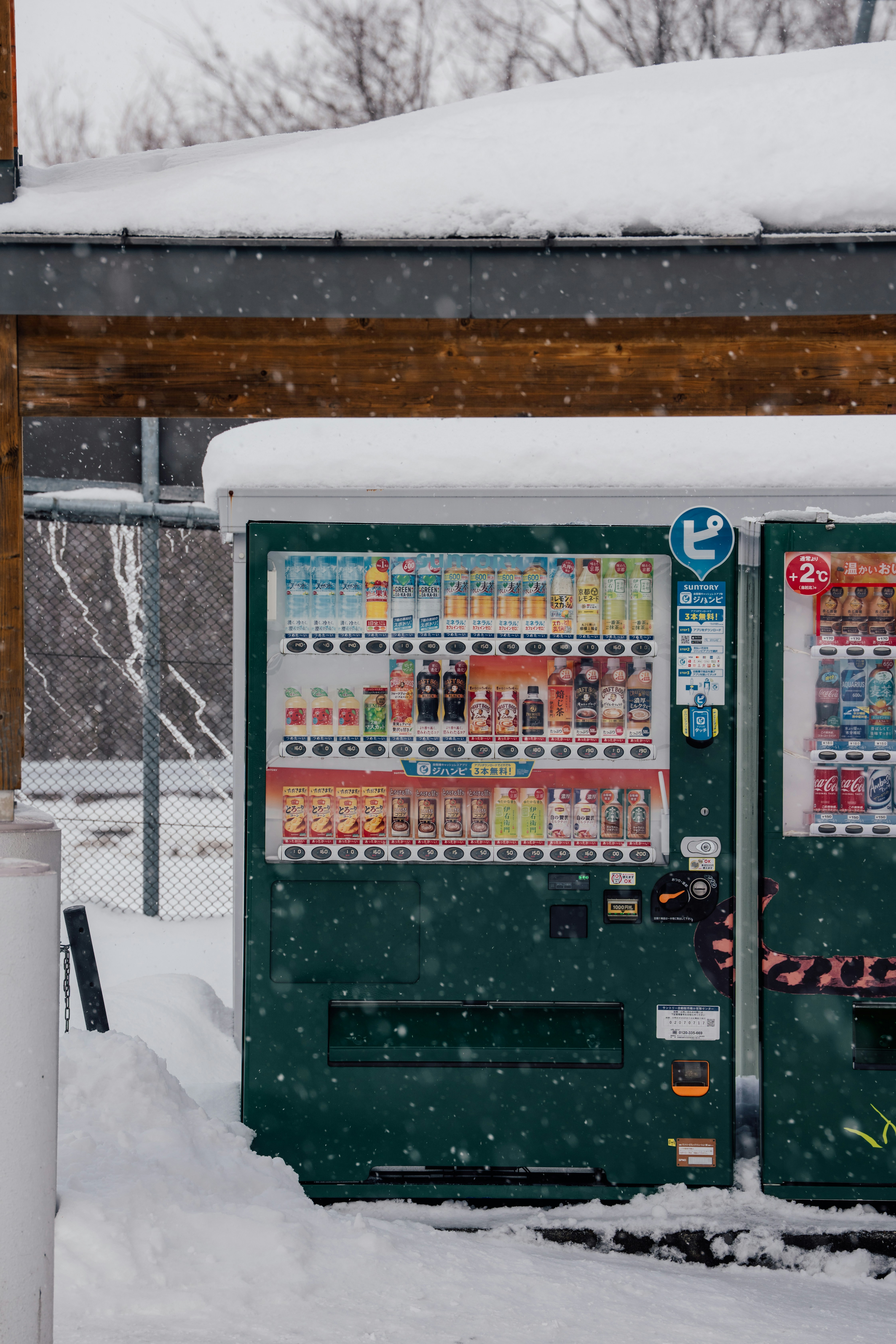 Vending machines covered in snow during winter