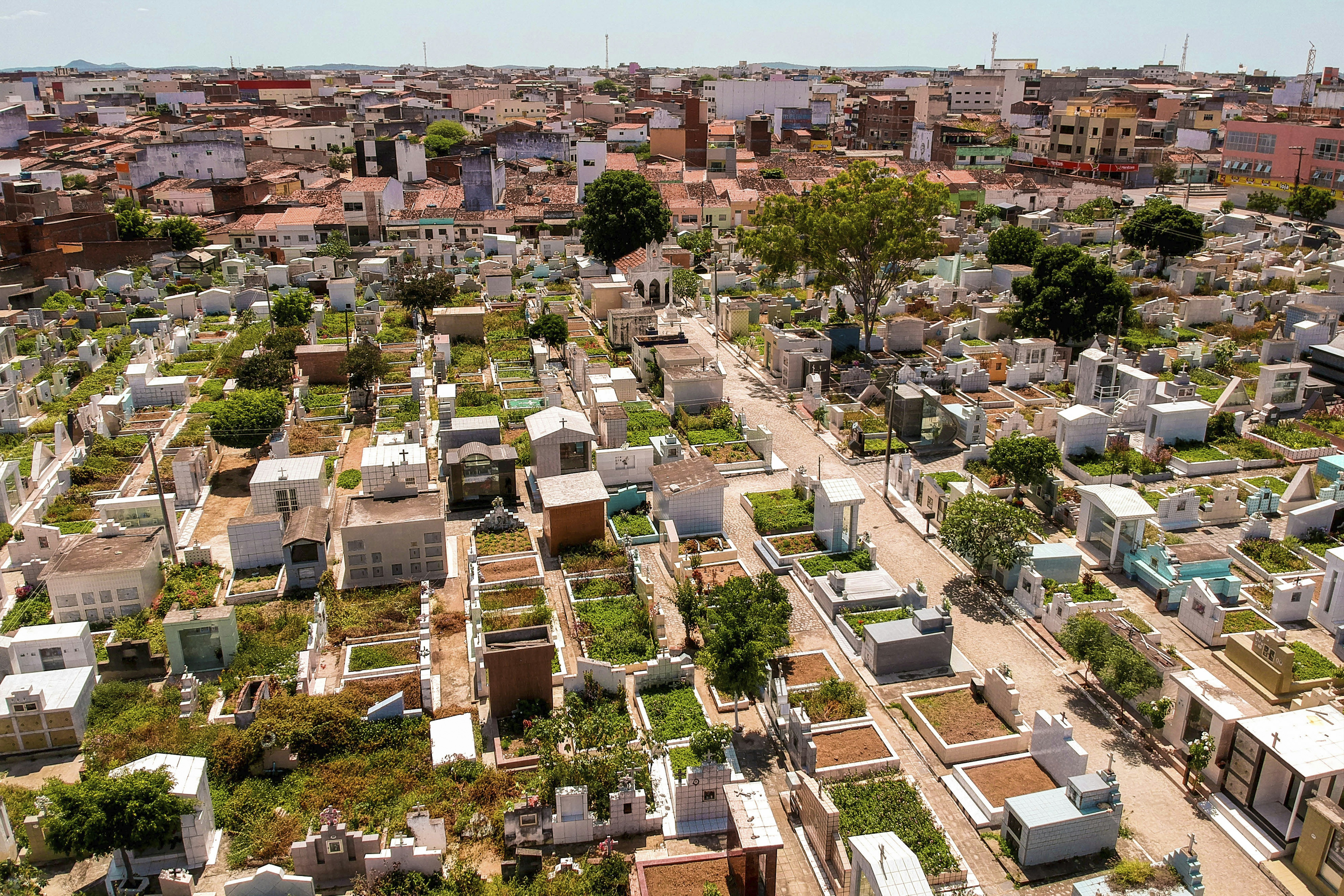 Aerial view of a densely packed cemetery with many tombstones.