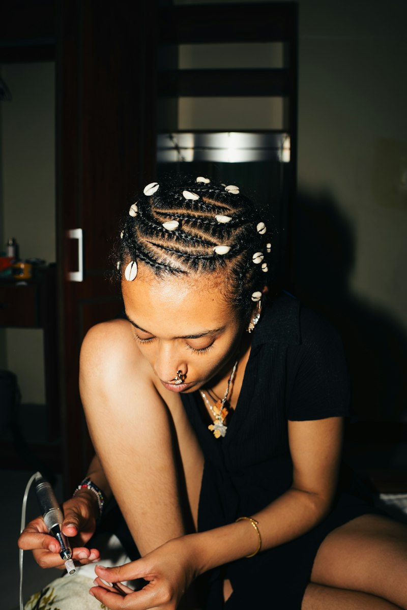 Freestyle cornrows with a heart design.
