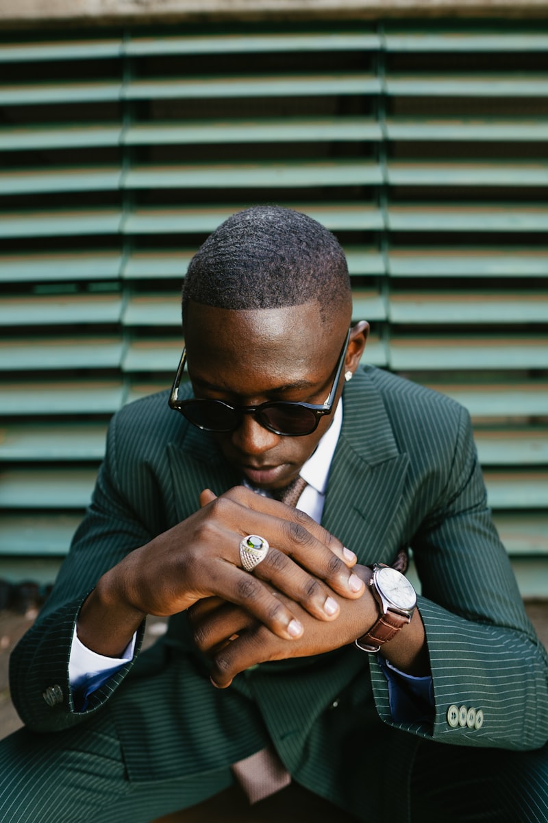 man checking watch business luxury value