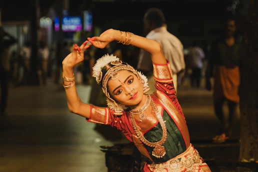 Young dancer in traditional indian costume performs gracefully.