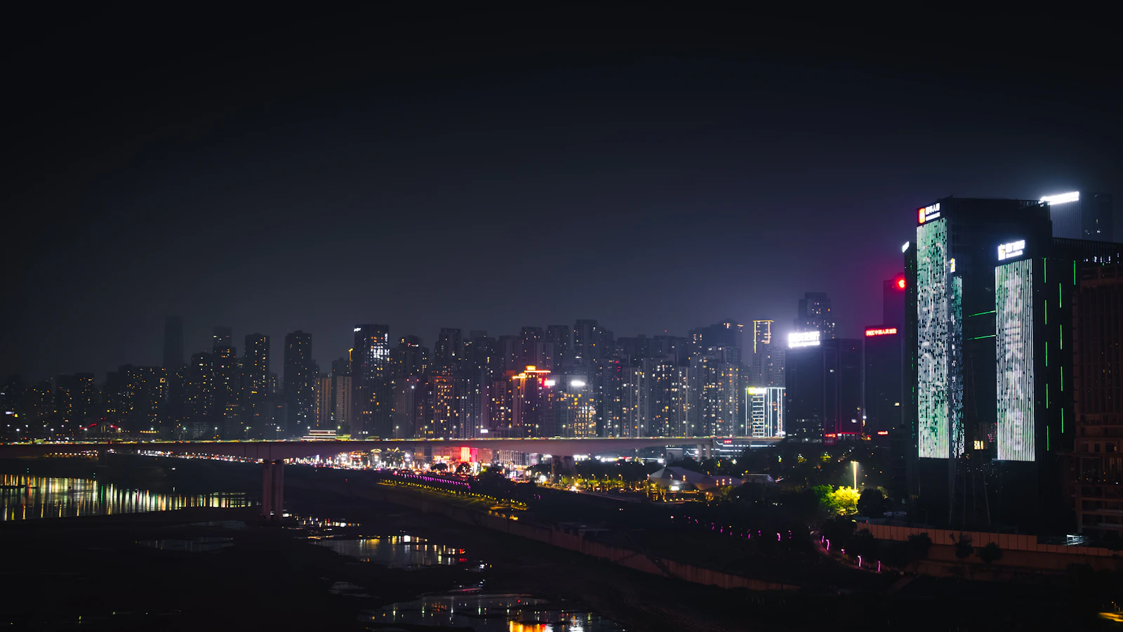 Chongqing skyline and river at night