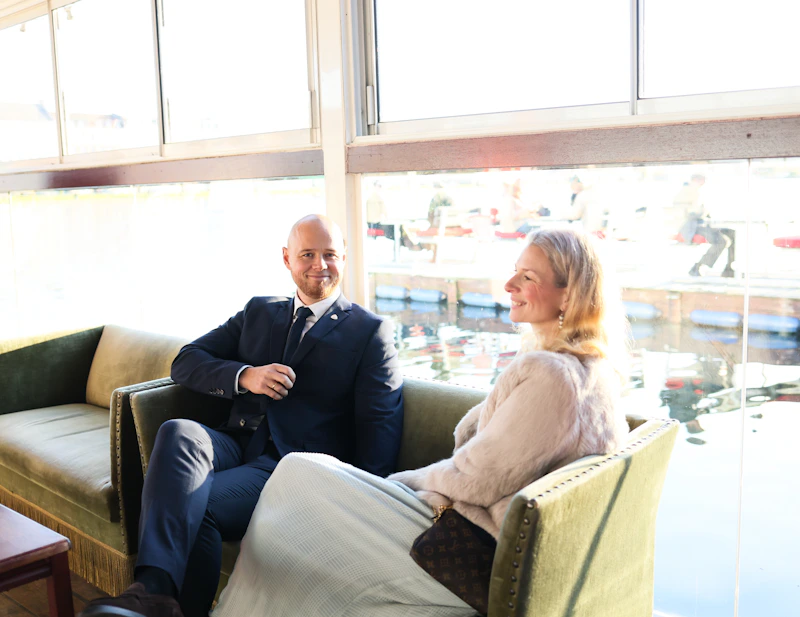 compatible couple sharing a quiet moment by the window