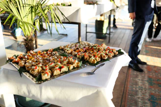 Two trays of appetizers on a table