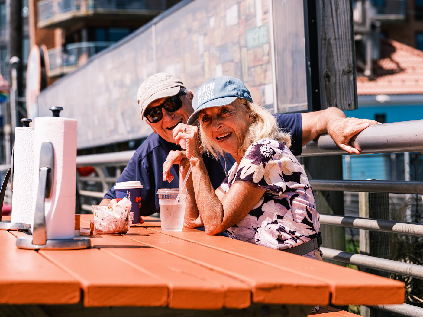 Older couple laughing together outdoors