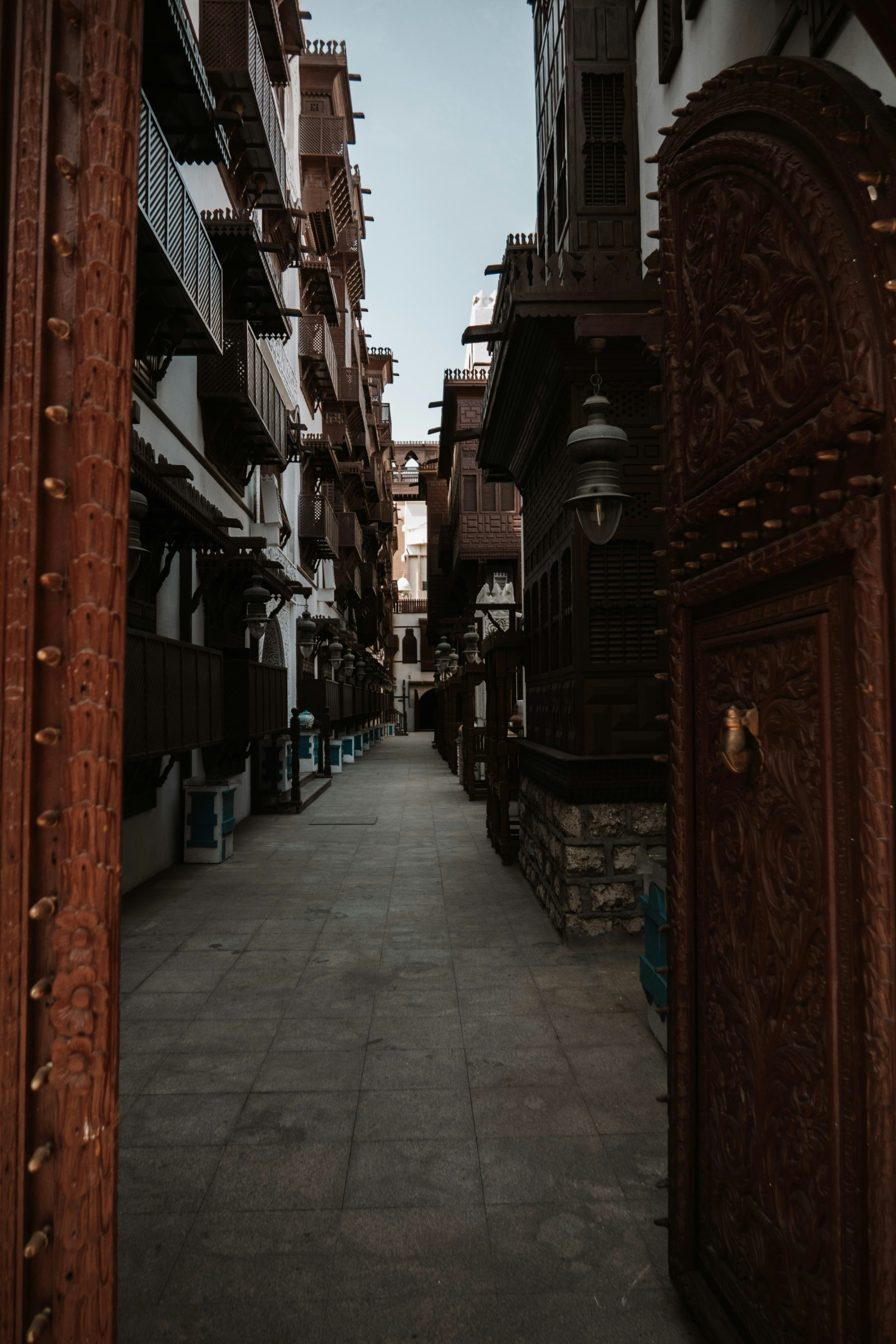 Narrow alleyway lined with traditional wooden buildings