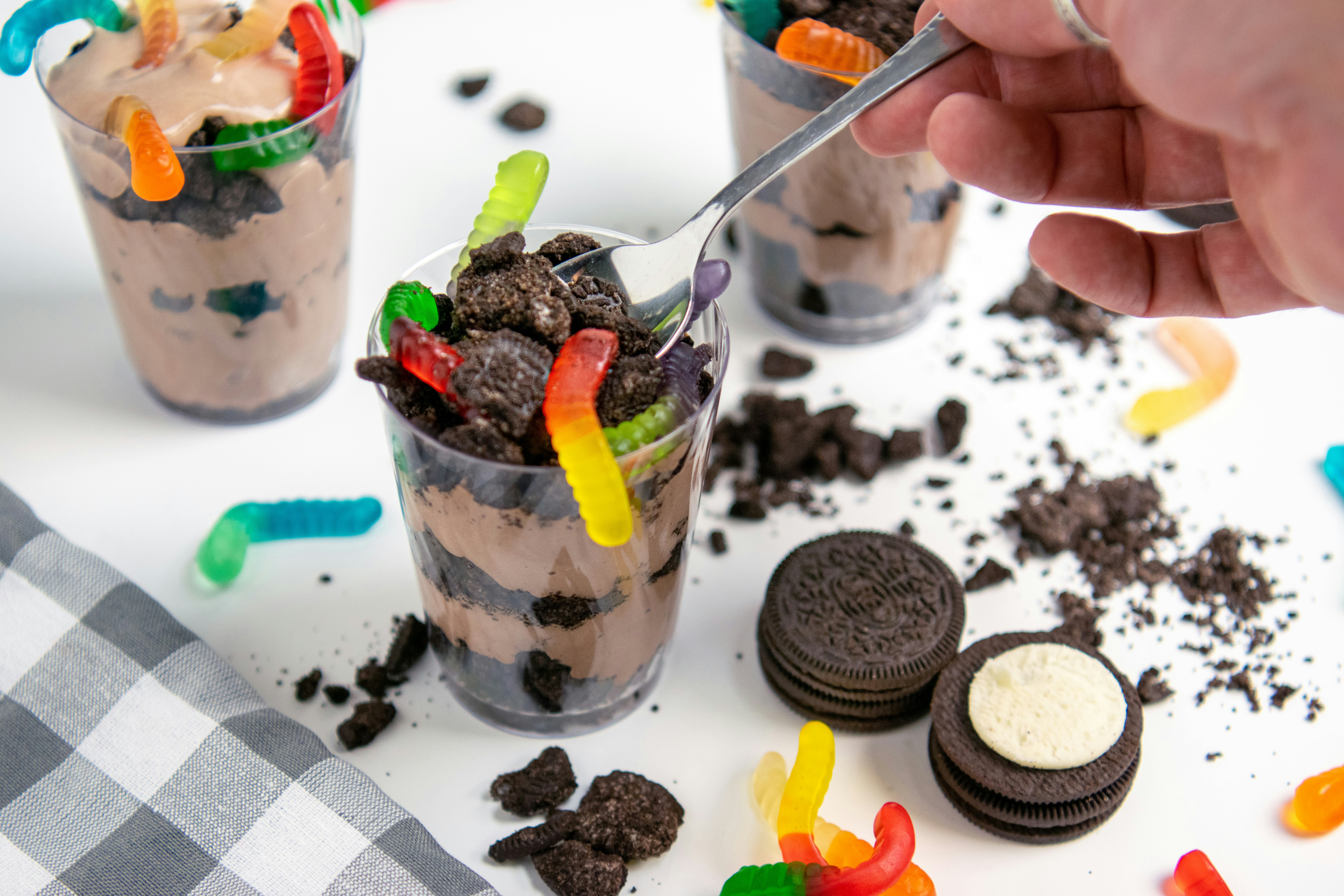 Chocolate pudding parfait with oreos and gummy worms