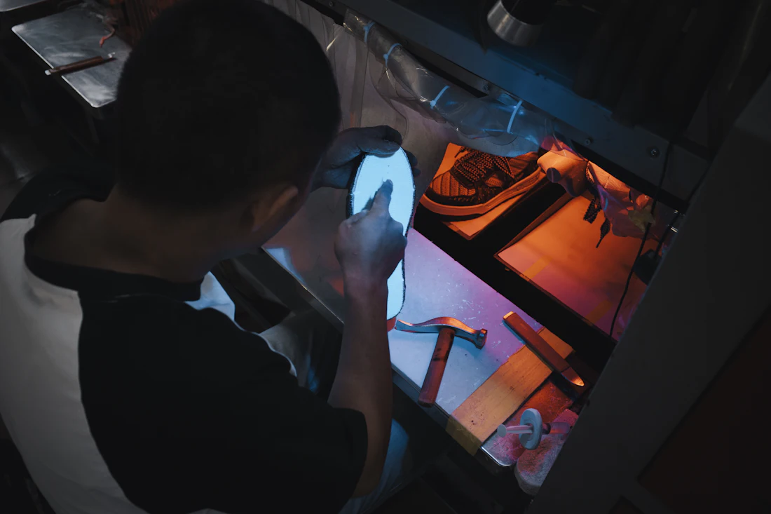 A component examined under inspection light