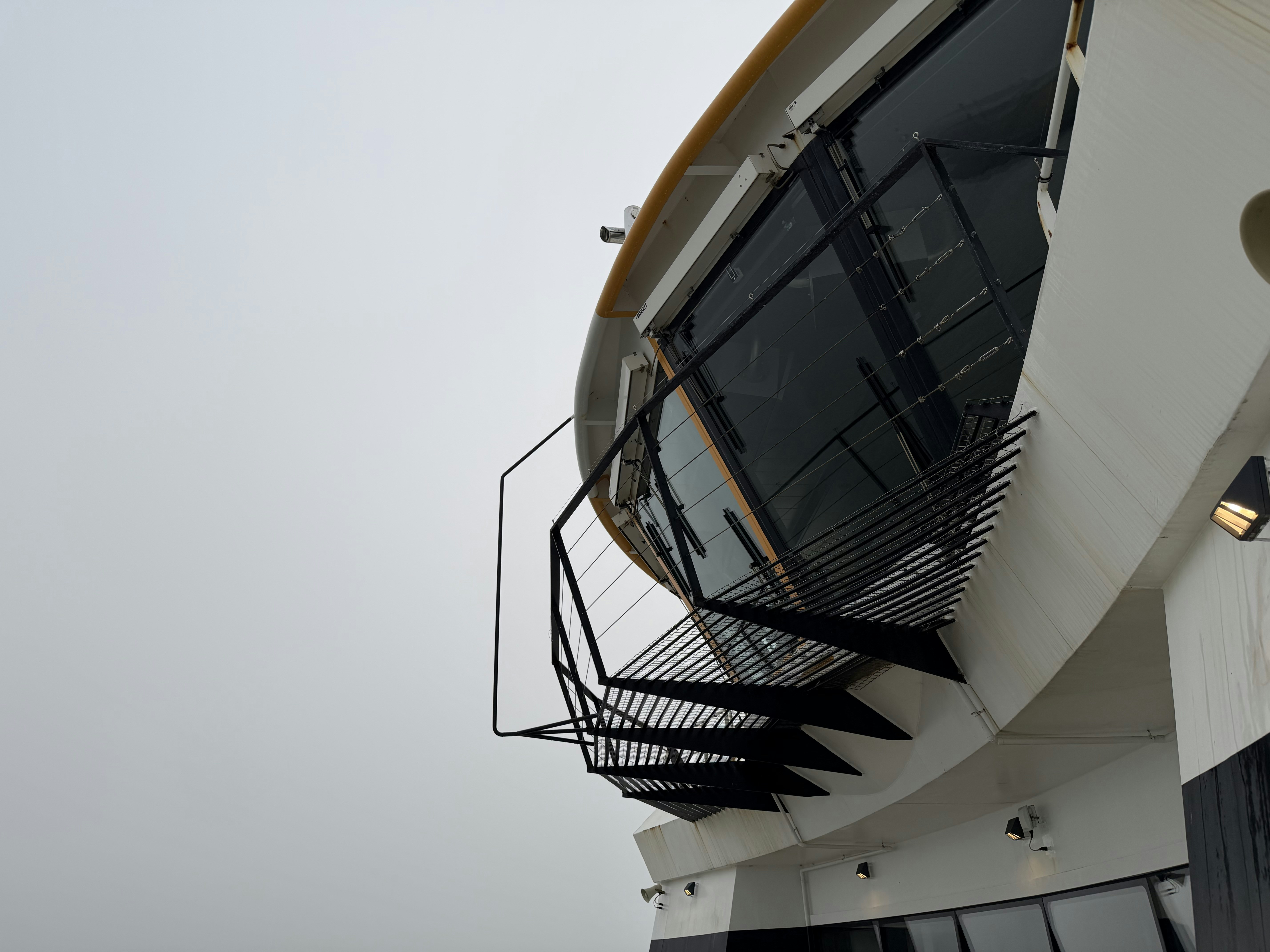 Modern ferry bridge with large windows and stairs