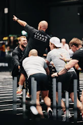 Team celebrating during a fitness competition