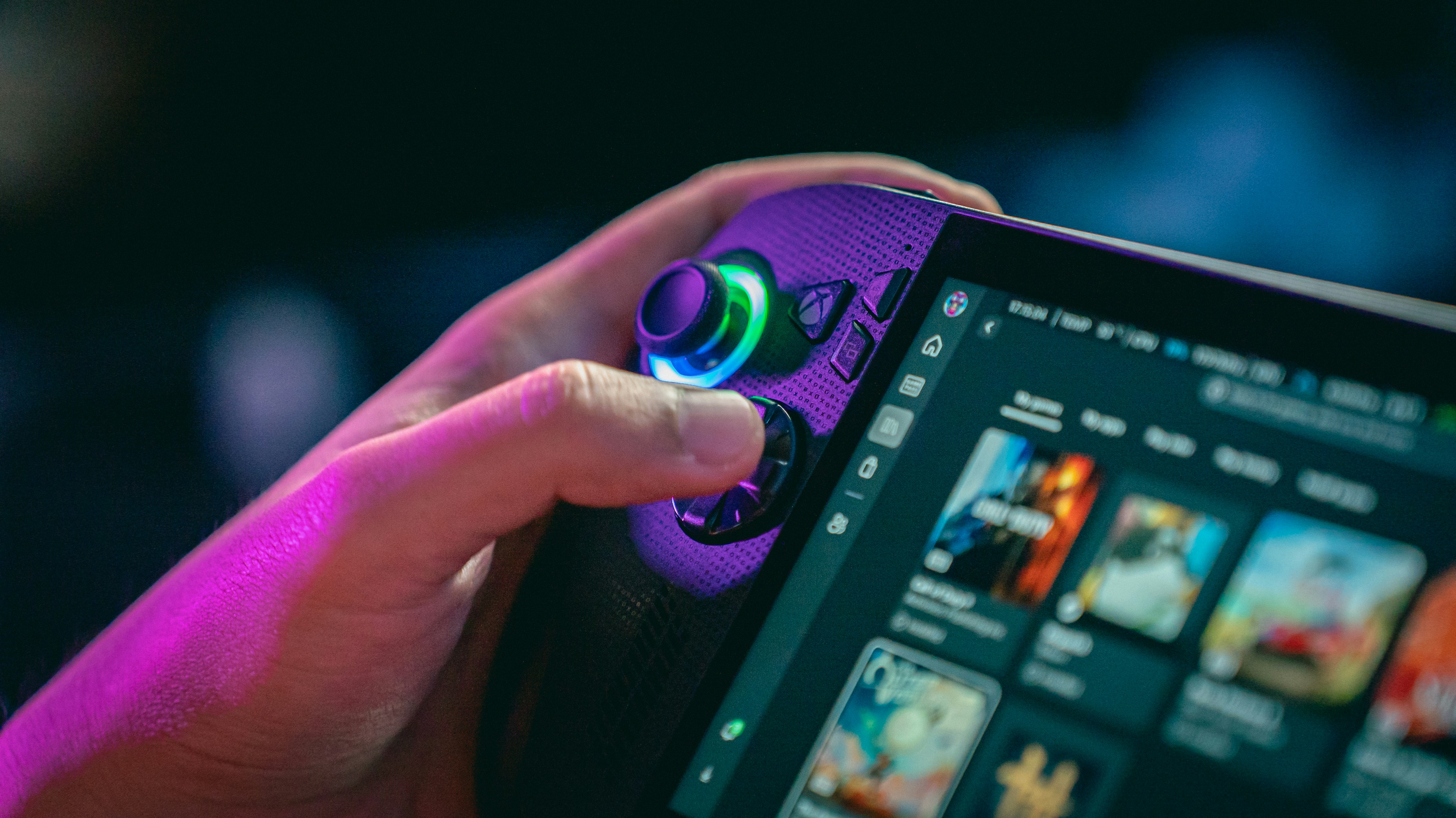 Person playing a video game on a handheld device.