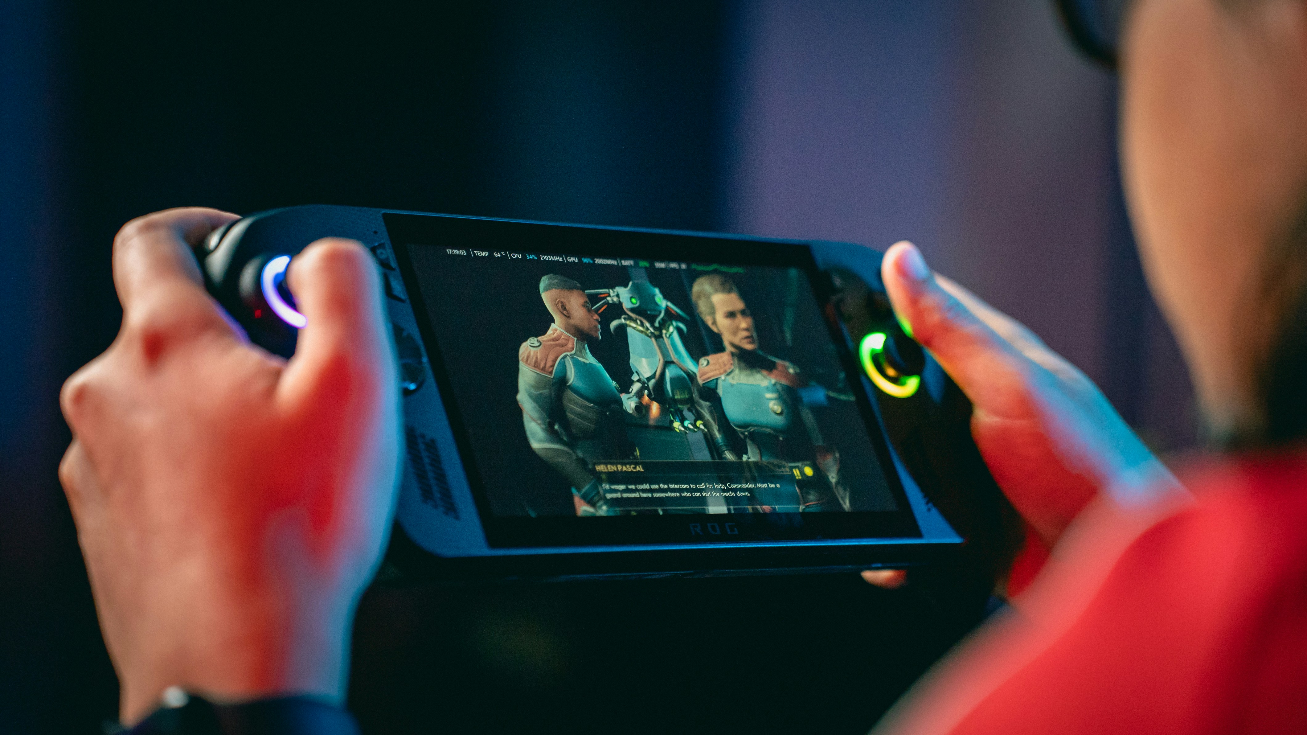 Person playing a video game on a handheld device