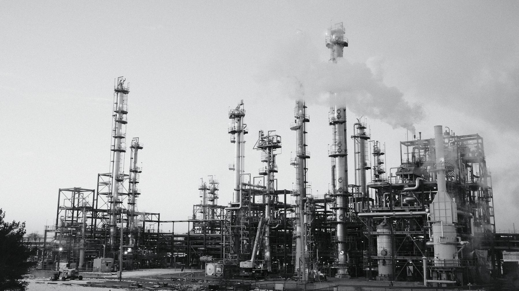 Oil refinery plant with multiple towers and stacks