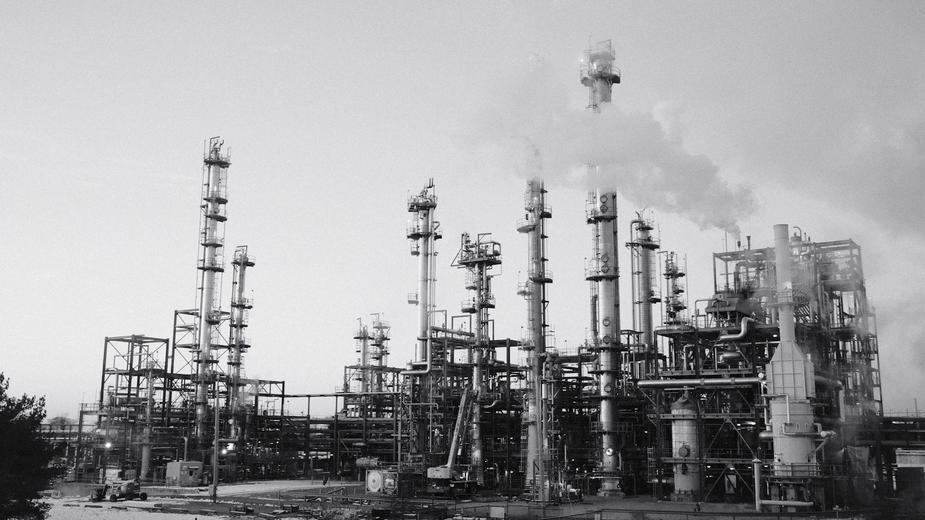 Industrial refinery under a clouded sky