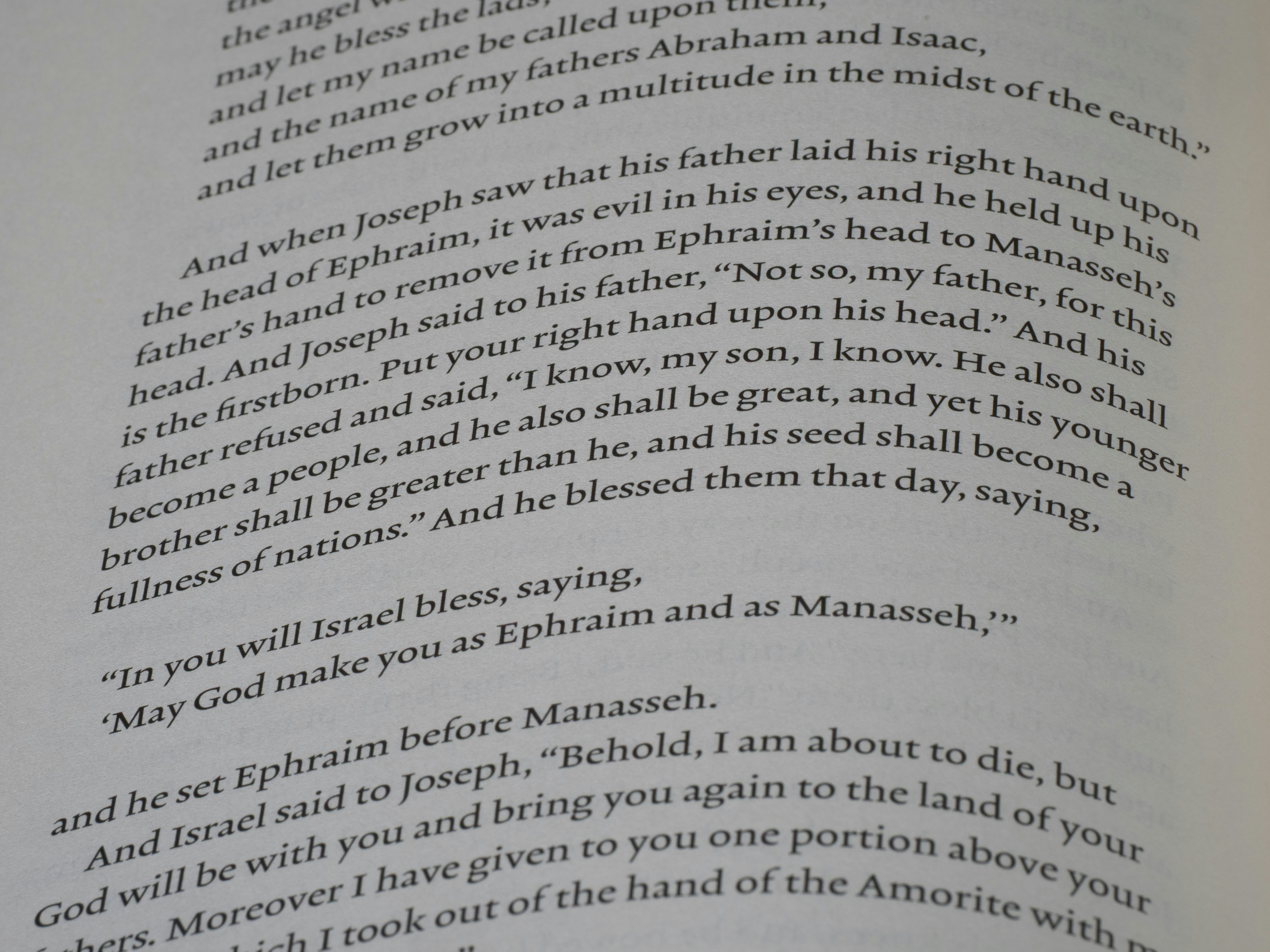 Close-up of an open book with text.