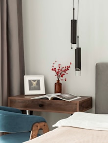 Modern bedside table with lamp and decor