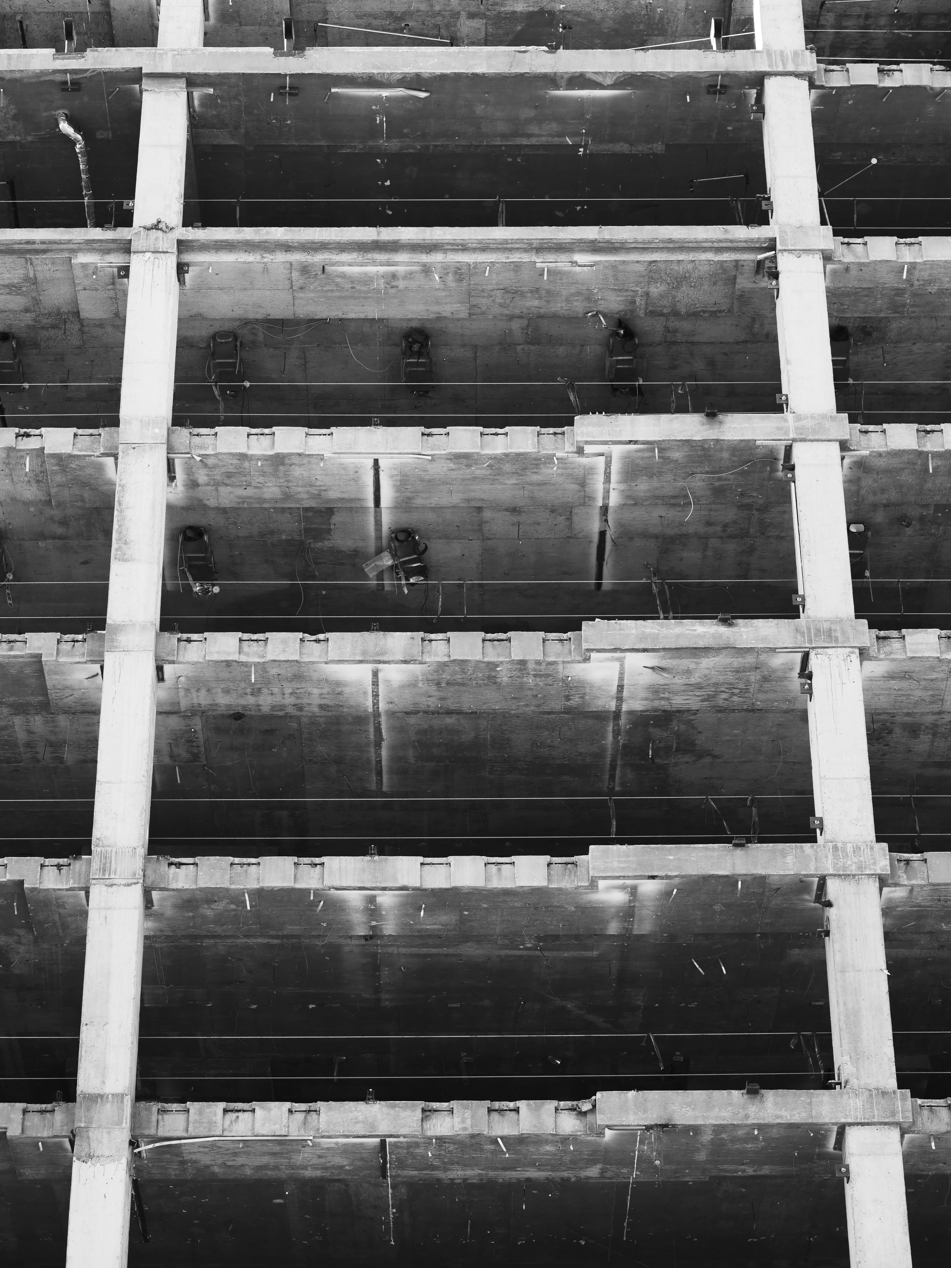 Abstract view of a concrete building under construction.