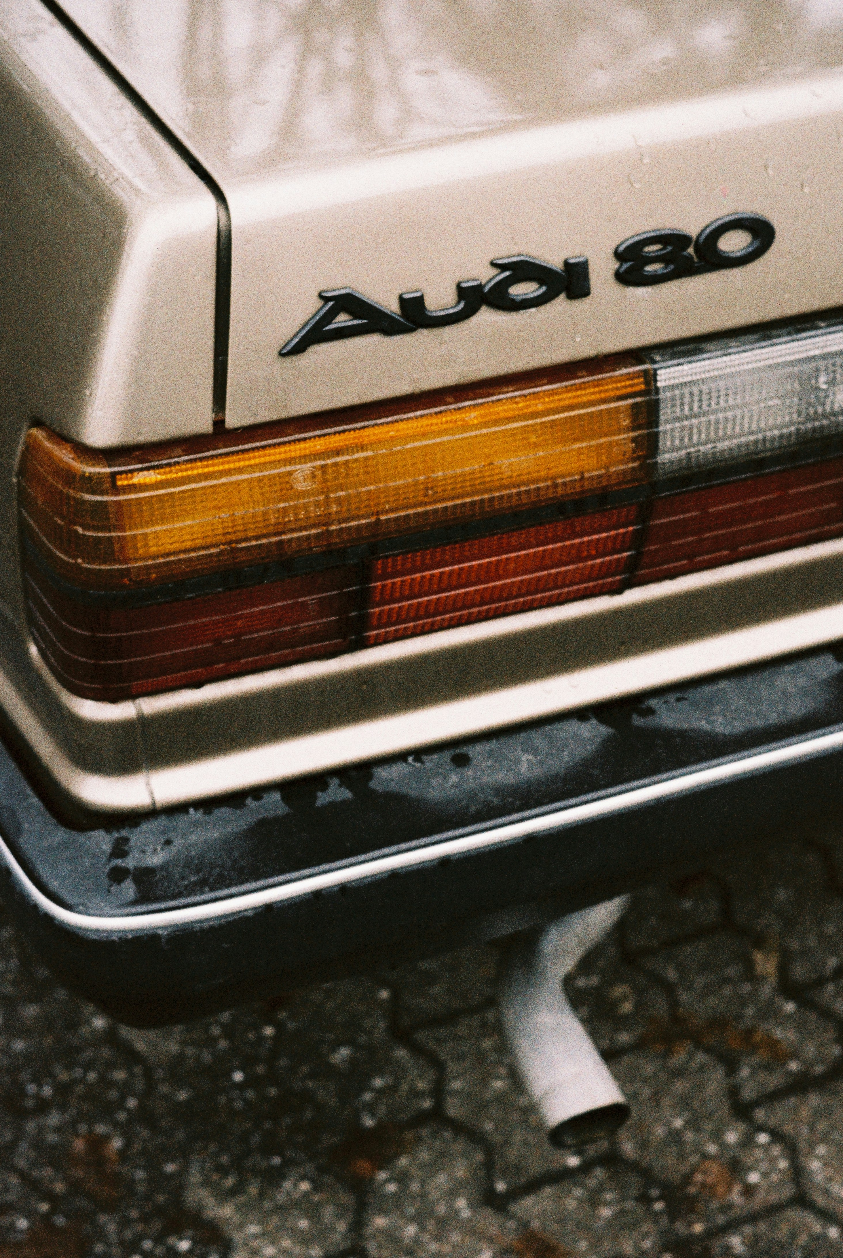 Close-up of a vintage audi 80 car tail light.