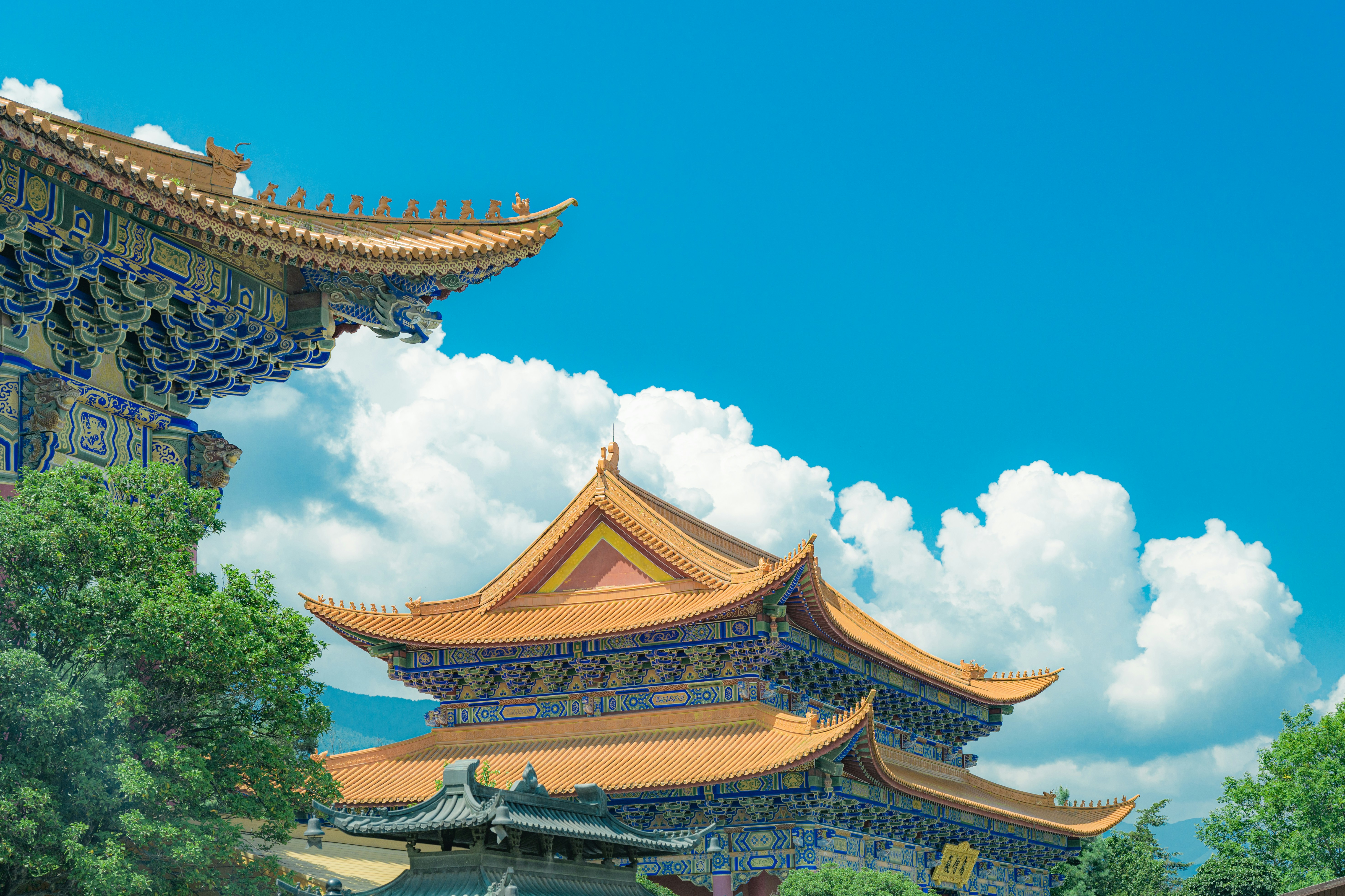 Traditional chinese temple roofs against a blue sky