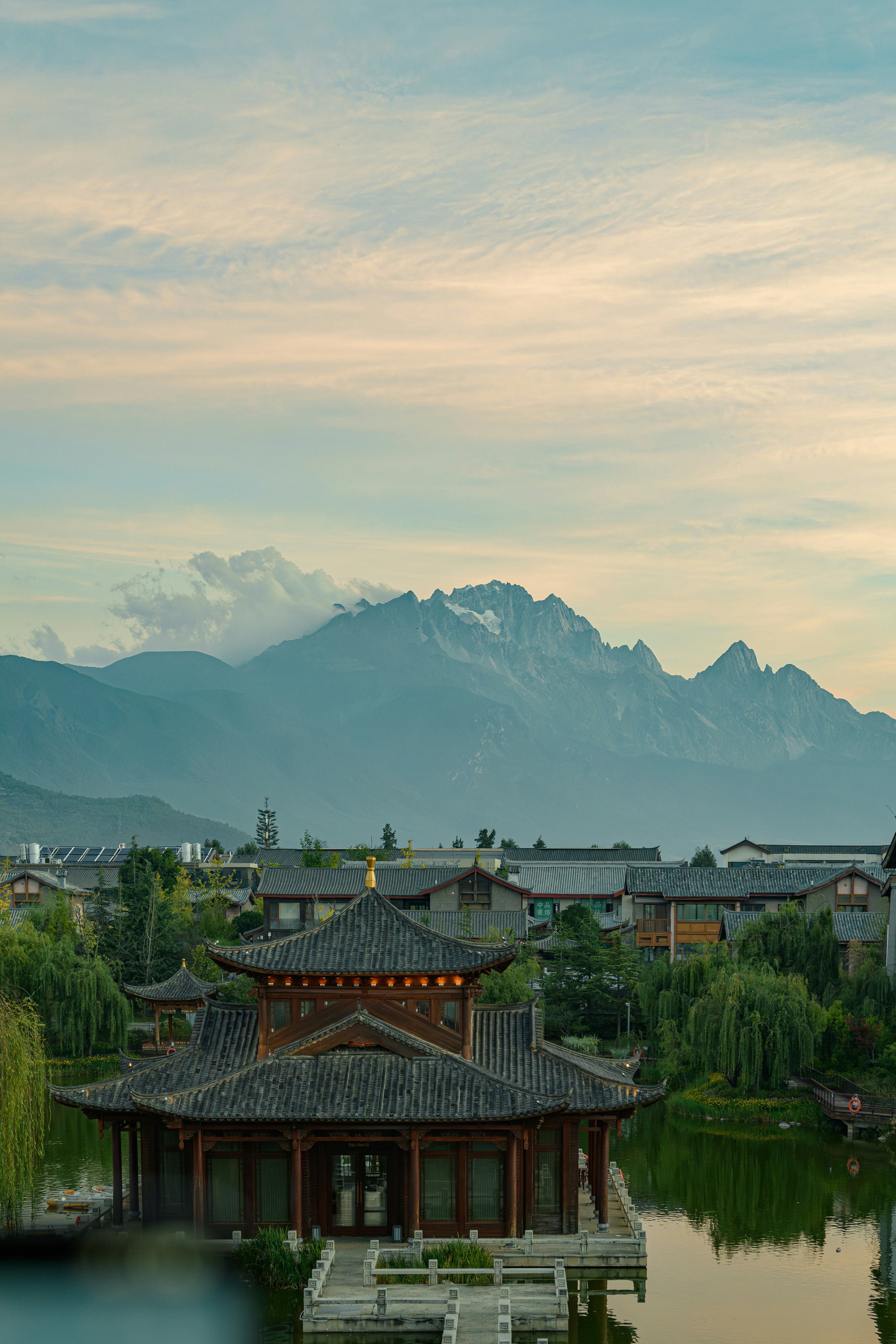 Traditional chinese architecture with mountains in background