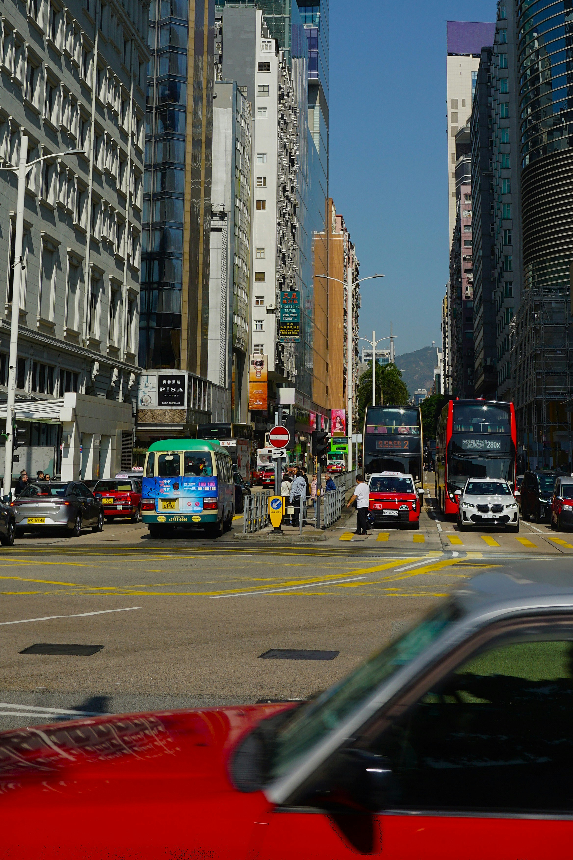 Taxi driving through city streets